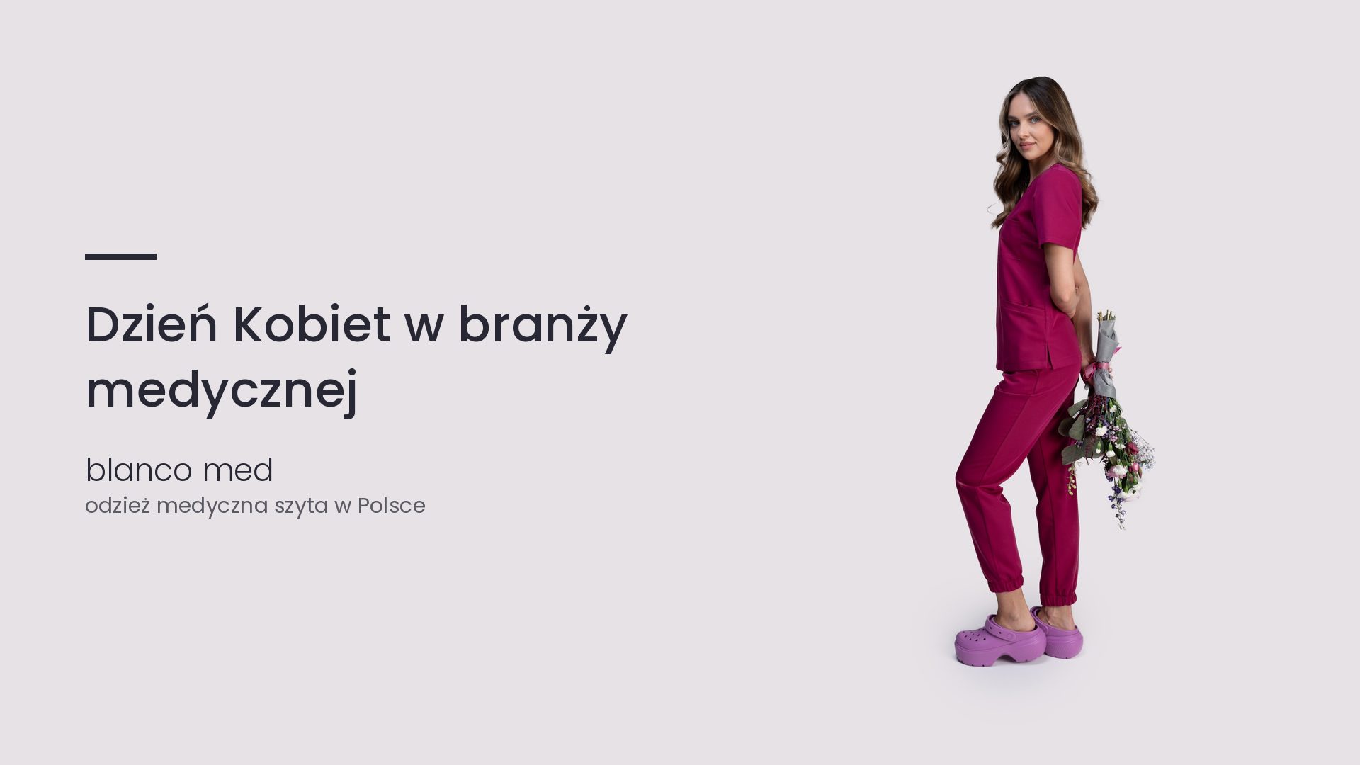Kobieta w malinowym komplecie medycznym Blanco Med. Dzień Kobiet w branży medycznej