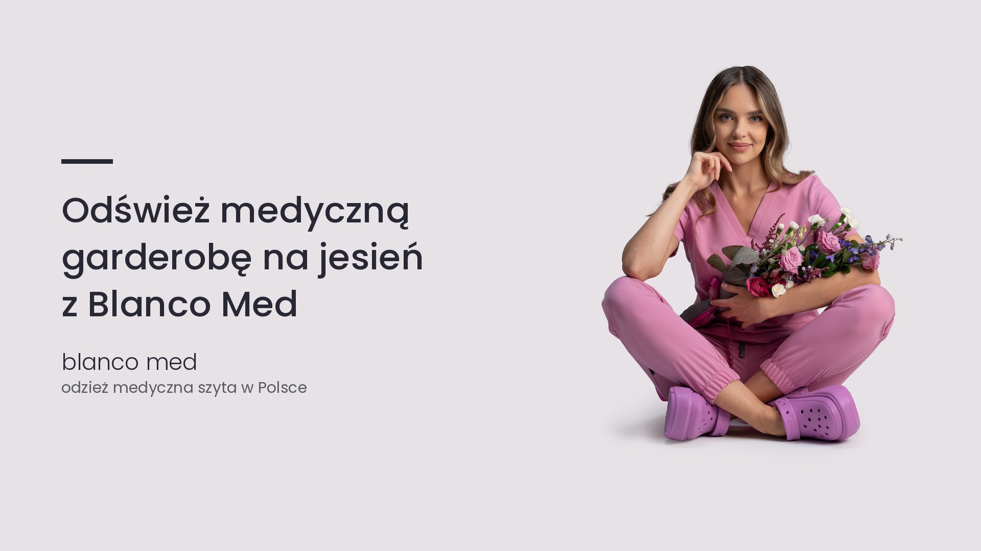 Kobieta w różowym komplecie medycznym Blanco Med. Odśwież medyczną garderobę na jesień z Blanco Med