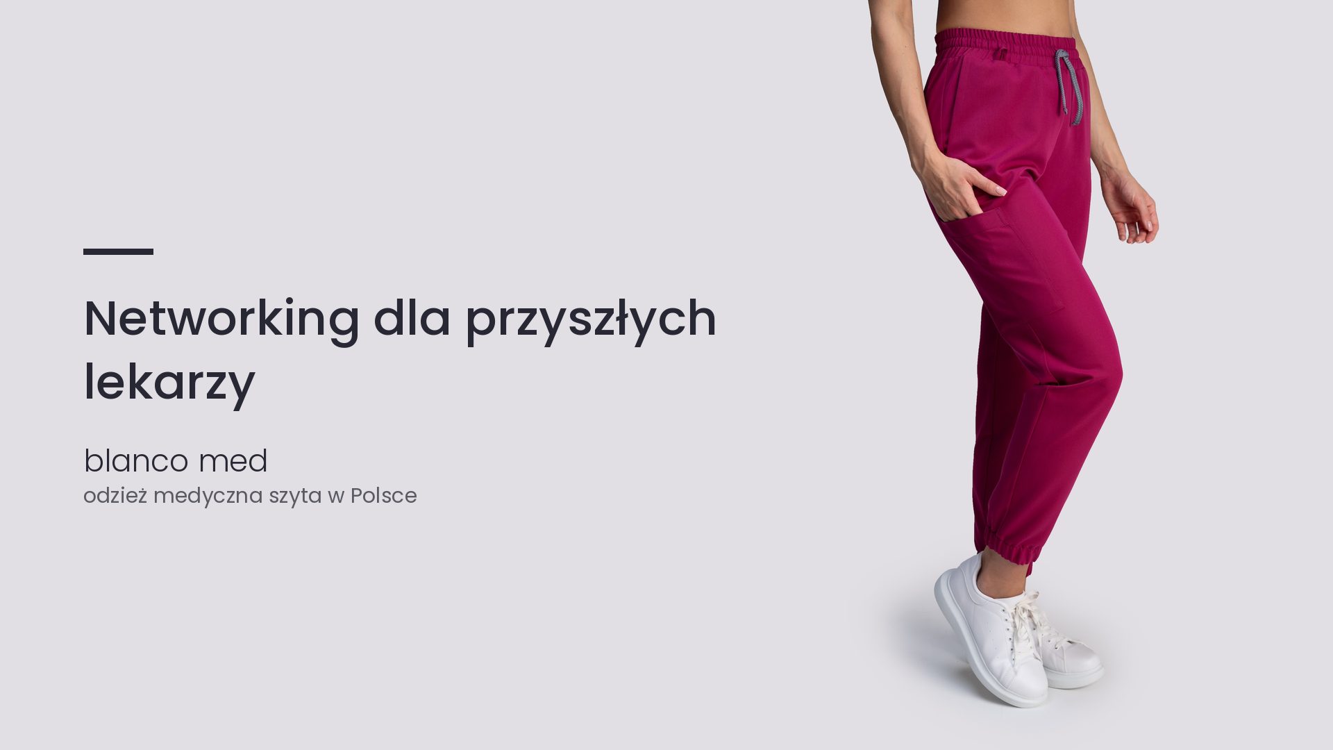 Kobieta w malinowym komplecie medycznym Blanco Med. Networking dla przyszłych lekarzy