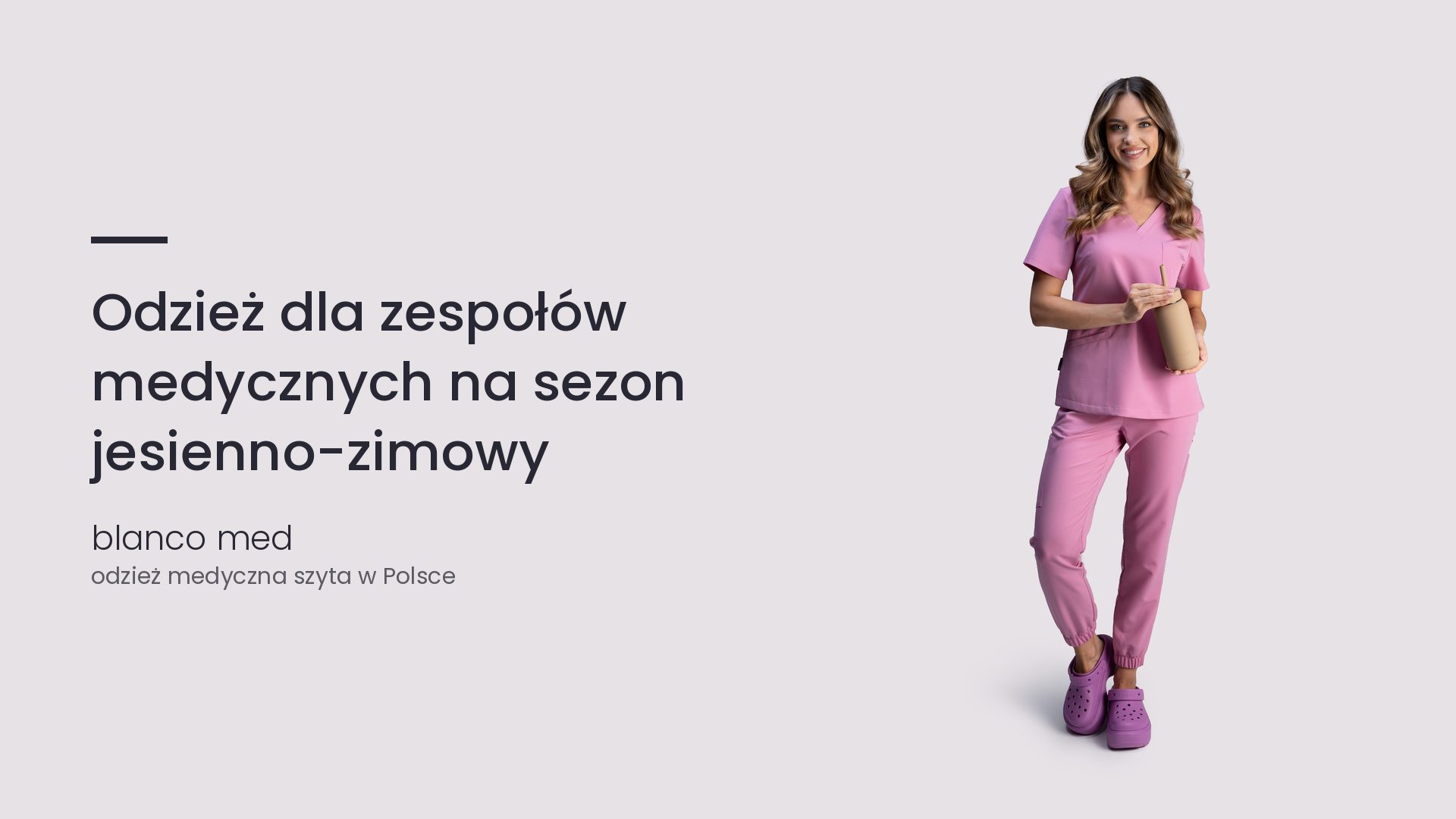 Kobieta w różowym komplecie medycznym Blanco Med. Odzież dla zespołów medycznych na sezon jesienno-zimowy